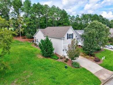 Enjoy true lock and go living in this beautiful gated, lakefront on The Patriot Golf Club At Grand Harbor in South Carolina - for sale on GolfHomes.com, golf home, golf lot