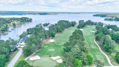 Enjoy true lock and go living in this beautiful gated, lakefront on The Patriot Golf Club At Grand Harbor in South Carolina - for sale on GolfHomes.com, golf home, golf lot