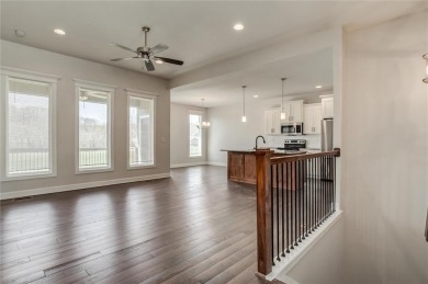 Enjoy low-maintenance living with golf course views in this on Teetering Rocks Links in Missouri - for sale on GolfHomes.com, golf home, golf lot