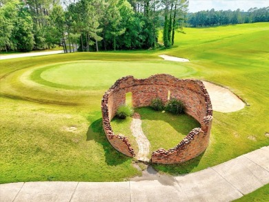 Enjoy true lock and go living in this beautiful gated, lakefront on The Patriot Golf Club At Grand Harbor in South Carolina - for sale on GolfHomes.com, golf home, golf lot
