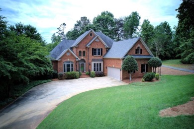 Stunning custom brick home located in the prestigious Carolina on The Carolina Country Club in South Carolina - for sale on GolfHomes.com, golf home, golf lot