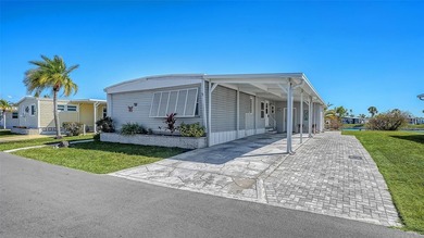 Welcome to Venice Isle, a highly sought-after 55+ mobile home on Pelican Pointe Golf and Country Club in Florida - for sale on GolfHomes.com, golf home, golf lot
