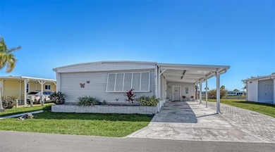Welcome to Venice Isle, a highly sought-after 55+ mobile home on Pelican Pointe Golf and Country Club in Florida - for sale on GolfHomes.com, golf home, golf lot