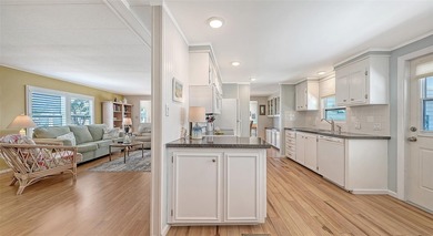 Welcome to Venice Isle, a highly sought-after 55+ mobile home on Pelican Pointe Golf and Country Club in Florida - for sale on GolfHomes.com, golf home, golf lot