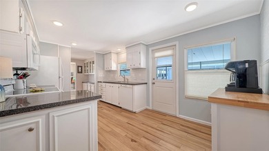 Welcome to Venice Isle, a highly sought-after 55+ mobile home on Pelican Pointe Golf and Country Club in Florida - for sale on GolfHomes.com, golf home, golf lot