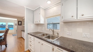 Welcome to Venice Isle, a highly sought-after 55+ mobile home on Pelican Pointe Golf and Country Club in Florida - for sale on GolfHomes.com, golf home, golf lot