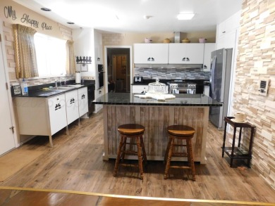 This beautifully maintained 5-bed, 4-bath ranch-style home on Pampa Country Club in Texas - for sale on GolfHomes.com, golf home, golf lot