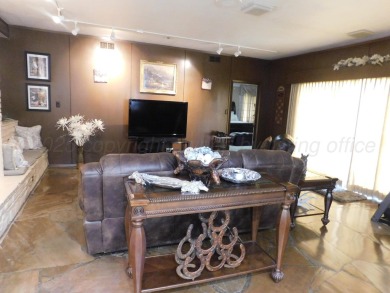 This beautifully maintained 5-bed, 4-bath ranch-style home on Pampa Country Club in Texas - for sale on GolfHomes.com, golf home, golf lot
