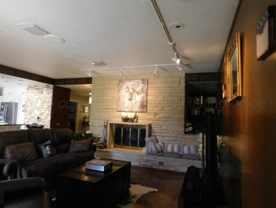 This beautifully maintained 5-bed, 4-bath ranch-style home on Pampa Country Club in Texas - for sale on GolfHomes.com, golf home, golf lot