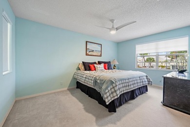 Beautifully maintained 3-bedroom, 2.5-bath, two-story home on PGA National Golf Club in Florida - for sale on GolfHomes.com, golf home, golf lot