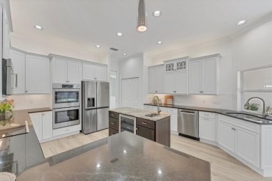 Prepare to fall in love with this exquisite 4-bedroom on Laurel Oak Country Club in Florida - for sale on GolfHomes.com, golf home, golf lot