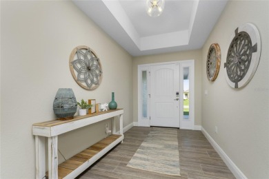 Turnkey furnished and income-producing, this beautifully on Rotonda Golf and Country Club The Palms Course in Florida - for sale on GolfHomes.com, golf home, golf lot
