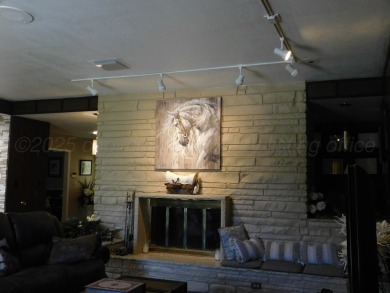 This beautifully maintained 5-bed, 4-bath ranch-style home on Pampa Country Club in Texas - for sale on GolfHomes.com, golf home, golf lot