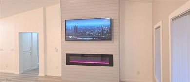 Fully updated Reno model with rare split bedrooms in Sun City on Highland Falls Golf Club in Nevada - for sale on GolfHomes.com, golf home, golf lot