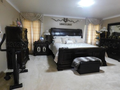 This beautifully maintained 5-bed, 4-bath ranch-style home on Pampa Country Club in Texas - for sale on GolfHomes.com, golf home, golf lot