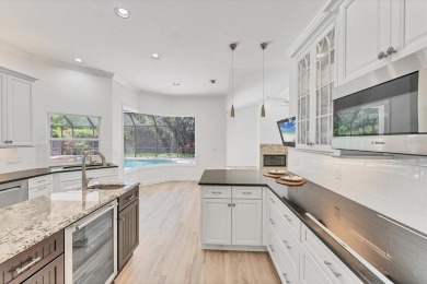 Prepare to fall in love with this exquisite 4-bedroom on Laurel Oak Country Club in Florida - for sale on GolfHomes.com, golf home, golf lot