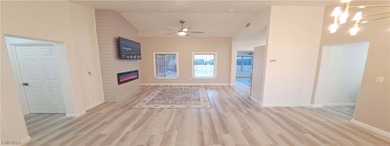 Fully updated Reno model with rare split bedrooms in Sun City on Highland Falls Golf Club in Nevada - for sale on GolfHomes.com, golf home, golf lot