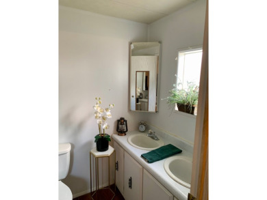 Price reduced, motivated seller. This 2-bedroom, 2-bath mobile on Plantation Golf Club in Florida - for sale on GolfHomes.com, golf home, golf lot