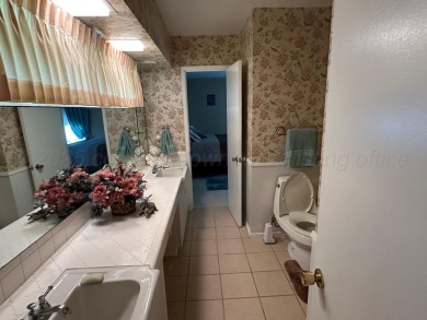 This beautifully maintained 5-bed, 4-bath ranch-style home on Pampa Country Club in Texas - for sale on GolfHomes.com, golf home, golf lot
