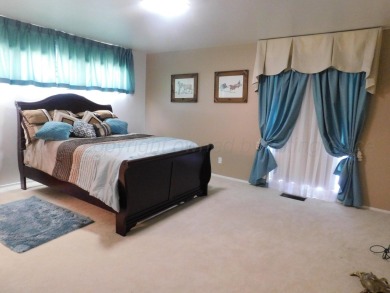 This beautifully maintained 5-bed, 4-bath ranch-style home on Pampa Country Club in Texas - for sale on GolfHomes.com, golf home, golf lot