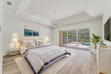 Prepare to fall in love with this exquisite 4-bedroom on Laurel Oak Country Club in Florida - for sale on GolfHomes.com, golf home, golf lot