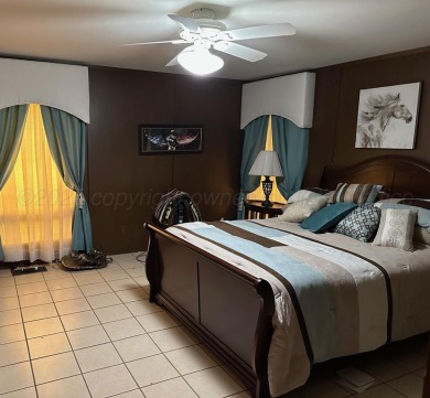 This beautifully maintained 5-bed, 4-bath ranch-style home on Pampa Country Club in Texas - for sale on GolfHomes.com, golf home, golf lot