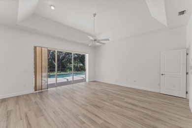 Prepare to fall in love with this exquisite 4-bedroom on Laurel Oak Country Club in Florida - for sale on GolfHomes.com, golf home, golf lot
