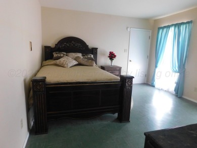 This beautifully maintained 5-bed, 4-bath ranch-style home on Pampa Country Club in Texas - for sale on GolfHomes.com, golf home, golf lot