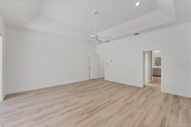Prepare to fall in love with this exquisite 4-bedroom on Laurel Oak Country Club in Florida - for sale on GolfHomes.com, golf home, golf lot