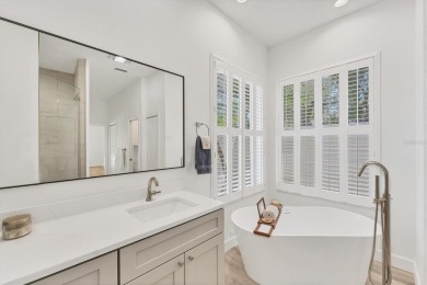 Prepare to fall in love with this exquisite 4-bedroom on Laurel Oak Country Club in Florida - for sale on GolfHomes.com, golf home, golf lot