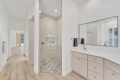 Prepare to fall in love with this exquisite 4-bedroom on Laurel Oak Country Club in Florida - for sale on GolfHomes.com, golf home, golf lot