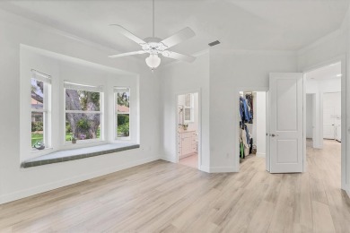 Prepare to fall in love with this exquisite 4-bedroom on Laurel Oak Country Club in Florida - for sale on GolfHomes.com, golf home, golf lot
