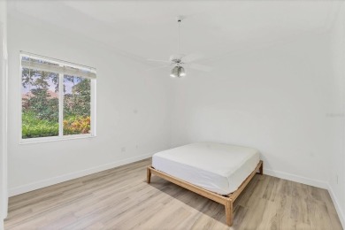Prepare to fall in love with this exquisite 4-bedroom on Laurel Oak Country Club in Florida - for sale on GolfHomes.com, golf home, golf lot