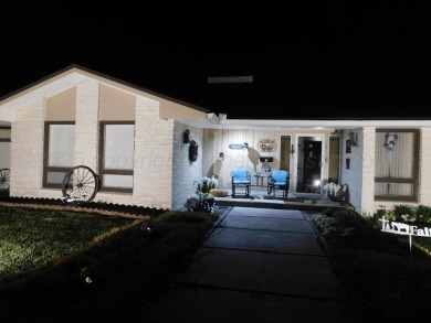 This beautifully maintained 5-bed, 4-bath ranch-style home on Pampa Country Club in Texas - for sale on GolfHomes.com, golf home, golf lot