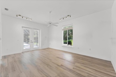 Prepare to fall in love with this exquisite 4-bedroom on Laurel Oak Country Club in Florida - for sale on GolfHomes.com, golf home, golf lot
