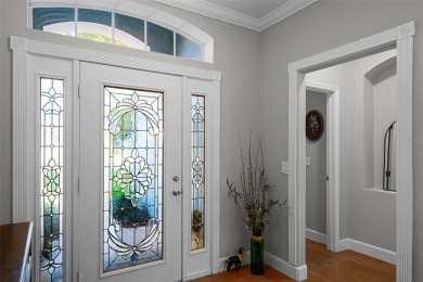 Welcome to this beautifully updated St. Regis model home in the on Kings Ridge Golf Club in Florida - for sale on GolfHomes.com, golf home, golf lot