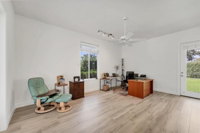 Prepare to fall in love with this exquisite 4-bedroom on Laurel Oak Country Club in Florida - for sale on GolfHomes.com, golf home, golf lot