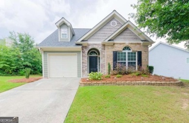 Welcome to this charming ranch-style home, situated on one of on Chateau Elan Golf Club  in Georgia - for sale on GolfHomes.com, golf home, golf lot