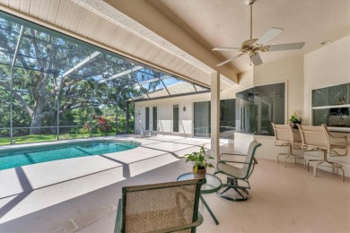 Prepare to fall in love with this exquisite four-bedroom on Laurel Oak Country Club in Florida - for sale on GolfHomes.com, golf home, golf lot