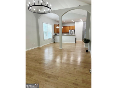 Welcome to this charming ranch-style home, situated on one of on Chateau Elan Golf Club  in Georgia - for sale on GolfHomes.com, golf home, golf lot
