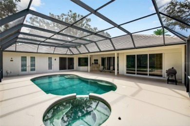 Prepare to fall in love with this exquisite four-bedroom on Laurel Oak Country Club in Florida - for sale on GolfHomes.com, golf home, golf lot
