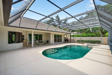 Prepare to fall in love with this exquisite four-bedroom on Laurel Oak Country Club in Florida - for sale on GolfHomes.com, golf home, golf lot