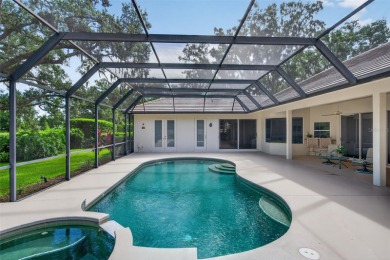 Prepare to fall in love with this exquisite four-bedroom on Laurel Oak Country Club in Florida - for sale on GolfHomes.com, golf home, golf lot