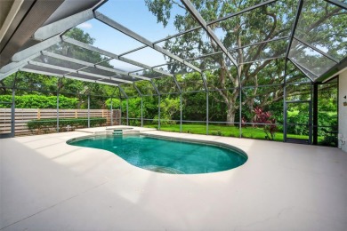 Prepare to fall in love with this exquisite four-bedroom on Laurel Oak Country Club in Florida - for sale on GolfHomes.com, golf home, golf lot