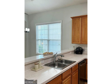 Welcome to this charming ranch-style home, situated on one of on Chateau Elan Golf Club  in Georgia - for sale on GolfHomes.com, golf home, golf lot