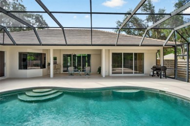 Prepare to fall in love with this exquisite four-bedroom on Laurel Oak Country Club in Florida - for sale on GolfHomes.com, golf home, golf lot