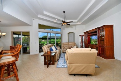 You must see this elegantly appointed home with its open floor on Estero Country Club in Florida - for sale on GolfHomes.com, golf home, golf lot