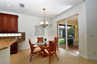 You must see this elegantly appointed home with its open floor on Estero Country Club in Florida - for sale on GolfHomes.com, golf home, golf lot