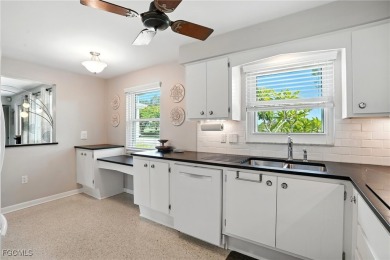 Fort Myers Mid-century classic. Authentically renovated with on Fort Myers Country Club in Florida - for sale on GolfHomes.com, golf home, golf lot