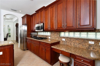 You must see this elegantly appointed home with its open floor on Estero Country Club in Florida - for sale on GolfHomes.com, golf home, golf lot